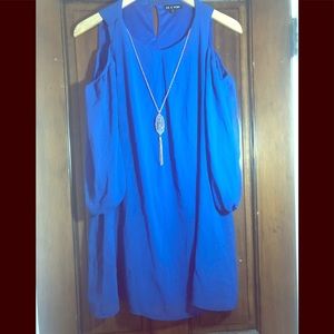 flowy blue dress with shoulder cut outs